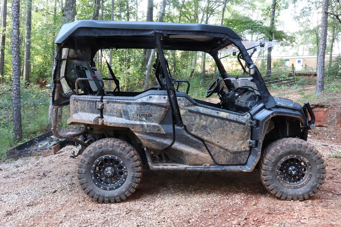 Side-by-side UTV parked in a forest. Photo: Big Blue Gnu, CC BY-SA 4.0, via Wikimedia Commons.